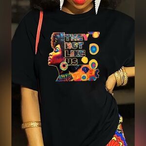Black Graphic T-Shirt with Colorful Design “They Not Like Us”